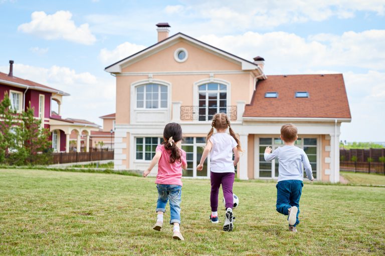 Children Playing by Beautiful House